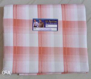 White And Pink Plaid Textile