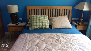 Wooden queen size bed with mattress and night