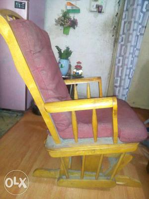 Yellow Wooden Base And Maroon Leather Padded Chair