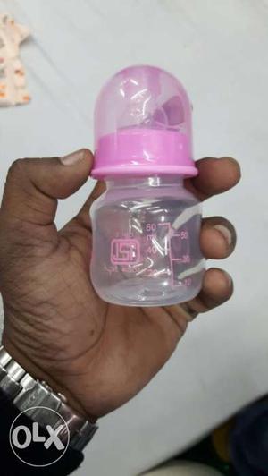 New Pink And White Plastic Feeding Bottle