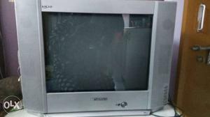 21 inch tv along with show case in good condition.