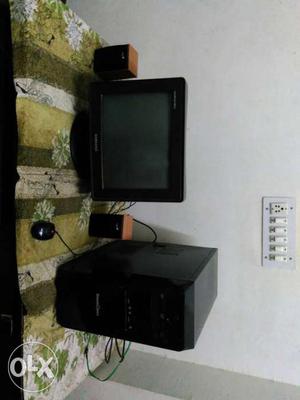 Black Computer Tower And Black Crt Monitor And Computer