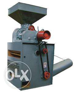 Rubber roll sheller and motor to operate it