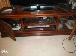 Tv cabinet made of solid wood. is in immaculate