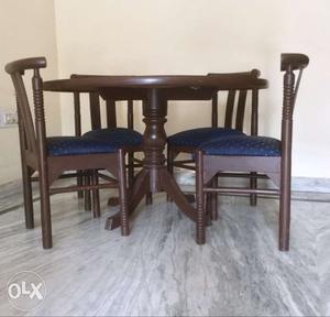 4-seater solid wood dining table. Table & 3