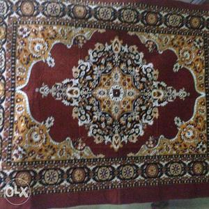 6.11" x 4.11" Two brown colored carpets