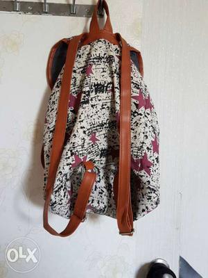 A cute once used leather bagpack..!