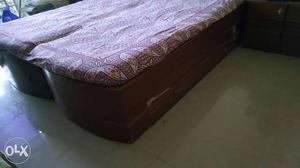 Bed with Mattress. Good Condition. Has storage