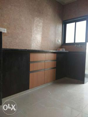 Black And Brown Wooden Kitchen Cabinet
