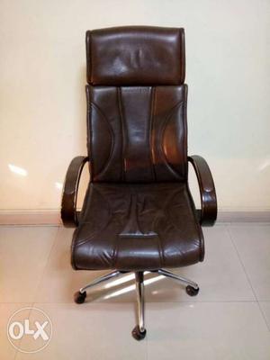 Brown Leather Rolling Armchaira