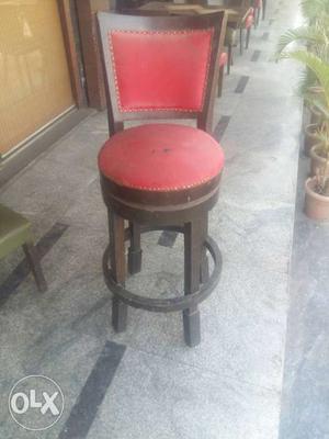 Brown Wooden Framed Red Cushion Chair