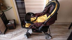 Brown Yellow And Black Stroller