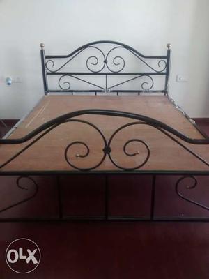 Queen size iron bed with ply, 1year old