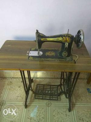 Sewing machine with stand