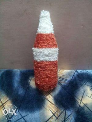 White And Red Rug Bottle
