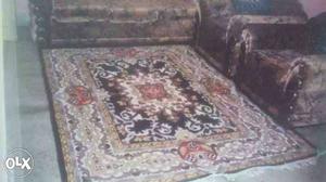 Woollen carpet of size 8 by 5.5 ft