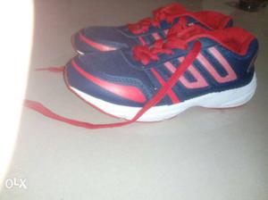 Blue White And Red Running Shoe