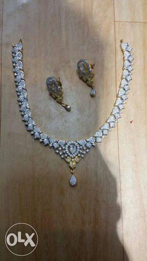 Gold Diamond Embellished Necklace And Earrings