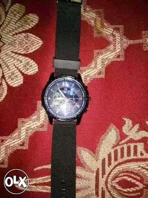 Navy And Diamond Round With Black Strap watch and brand only