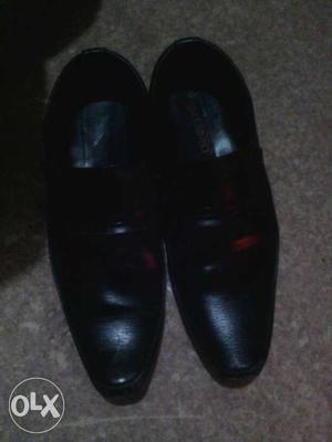 Pair Of Black Leather Slip On Shoes