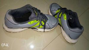 Pair Of Gray Green And White Running Shoes Nike Shoes size 7