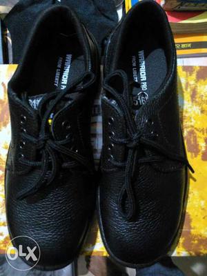 Pair Of Men's Black Leather Warrior Pro Shoes Brand New
