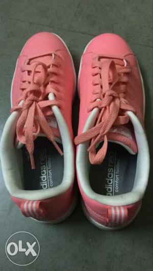Pair Of Pink And White Adidas Sneakers