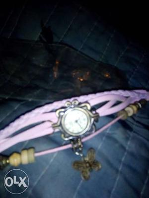 Pink Leather Strap Silver Framed Round Watch