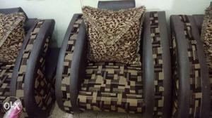 Brown And Gray Wooden Frame Padded Armchair