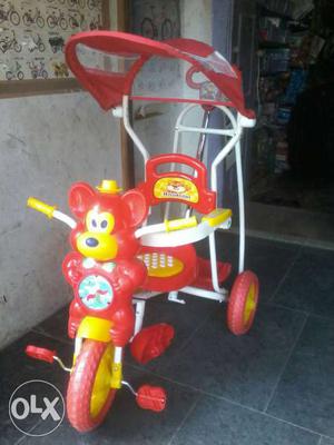 Children's Red White And Yellow Ride On Toy