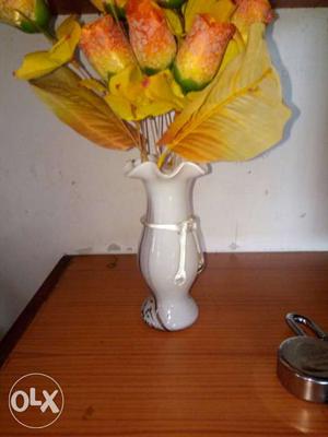 Orange And Yellow Flowers In White Ceramic Vase
