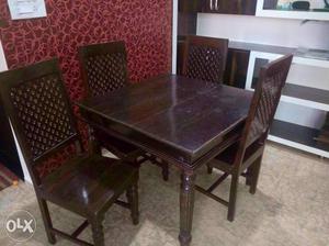 Pure sangwan wooden dining table with 4 chairs.
