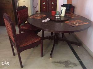 Rosewood Round dinning table, with 5chairs With rotator on
