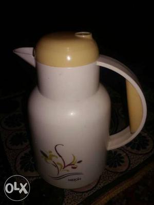 White And Yellow Thermos