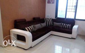 White Wooden Framed Brown Sectional Couch