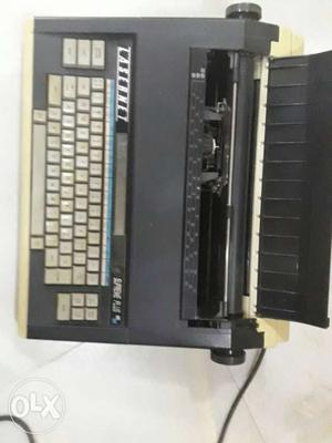 Black And Gray Electric Typewriter