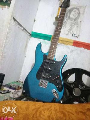 Blue And Black Stratocaster Guitar