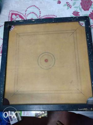 Carrom board on sale. 3 years old. medium size