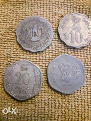 Four Silver Scalloped Coins