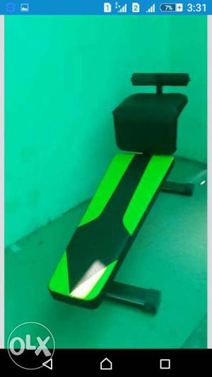 Green And Black Exercise Equipment