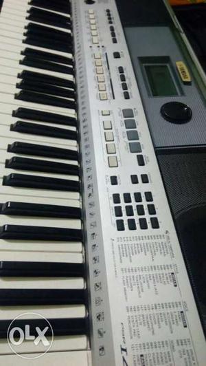 Grey And White Electronic Keyboard