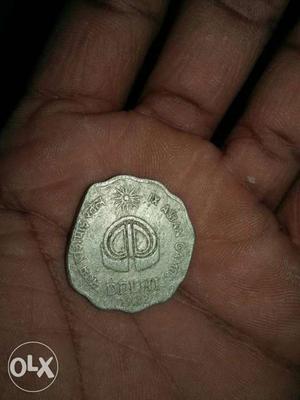 Its a 9th asian games dated coin 10paisa 