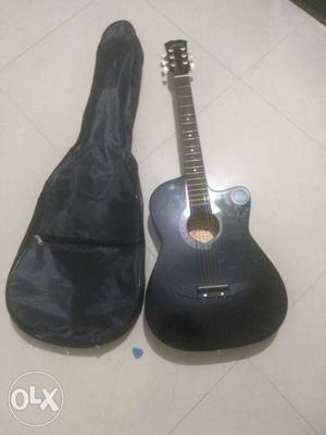 New F-Cut acoustic guitar hardly used for 1 month.