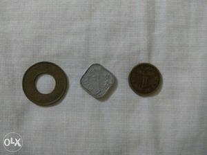 Old coins of one paisa.