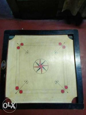 White Red And Black Carrom Board