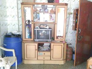 Gray Widescreen Television And Brown Wooden Tv Hutch