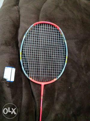 Red-and-blue badminton apace racket