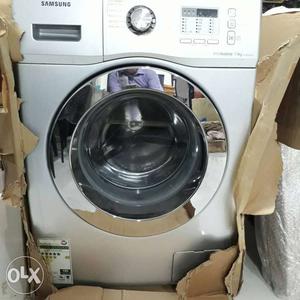 White And Silver Samsung Front Load Dryer