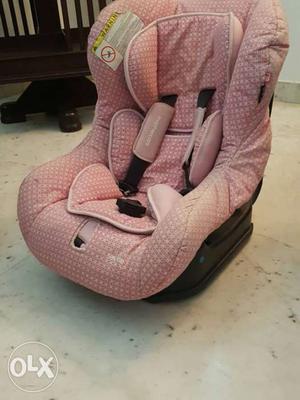 Baby's Pink And Black Car Booster Seat
