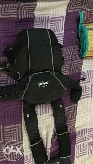 Black Chicco baby carrier